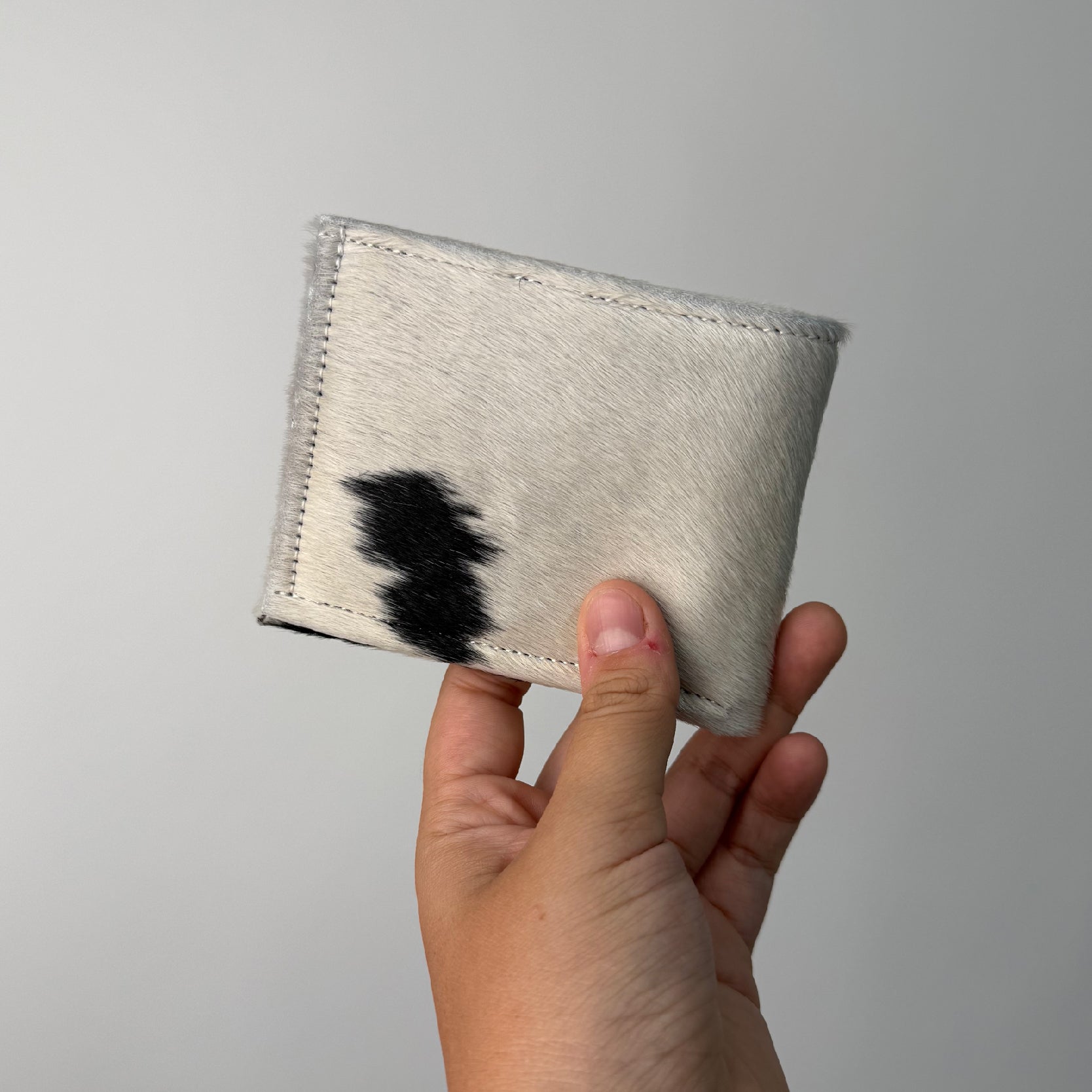 CARTERA PIEL PELO DE VACA