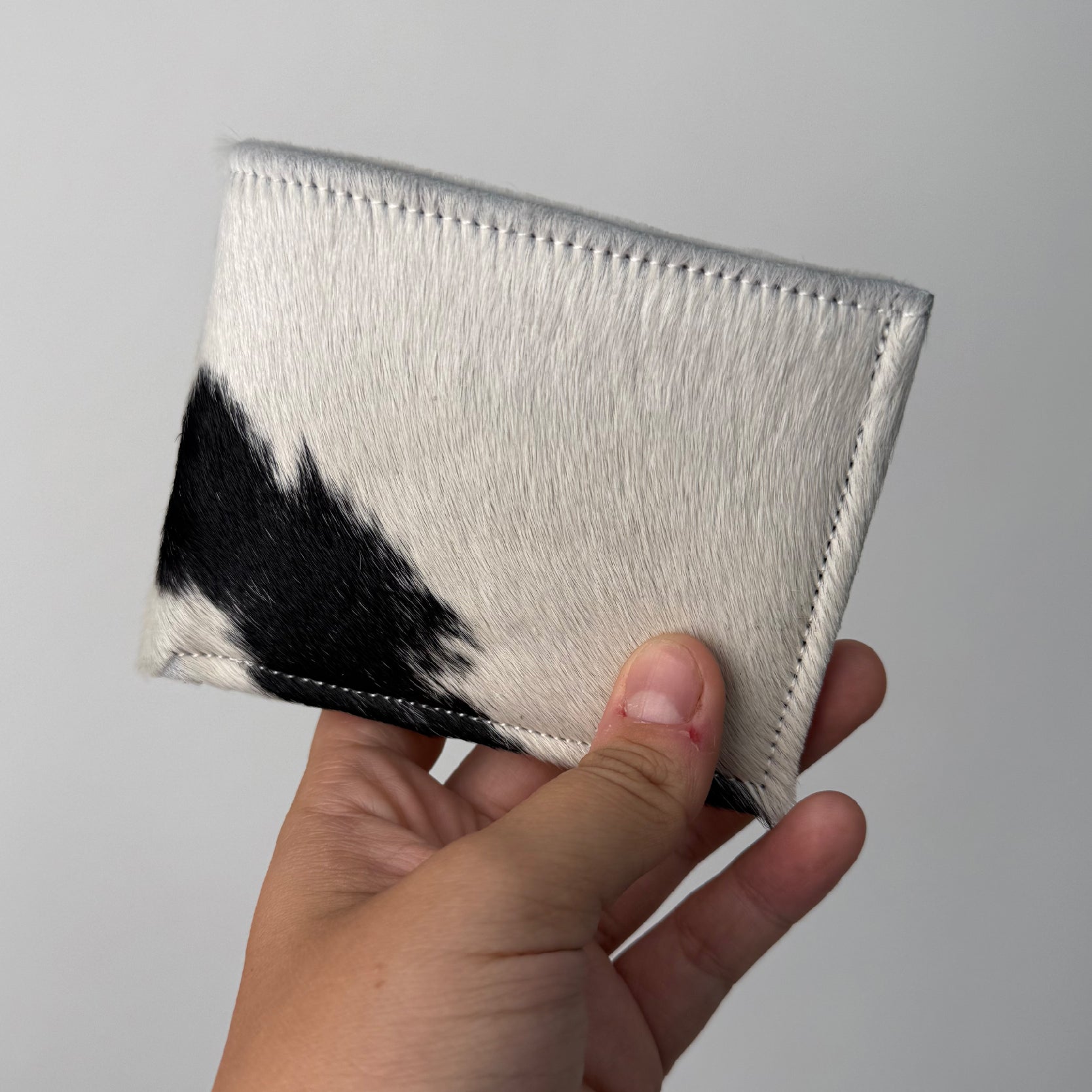 CARTERA PIEL PELO DE VACA